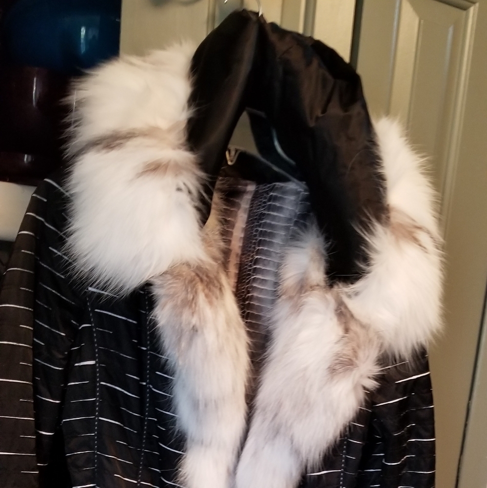 Womens long fox trimed coat.